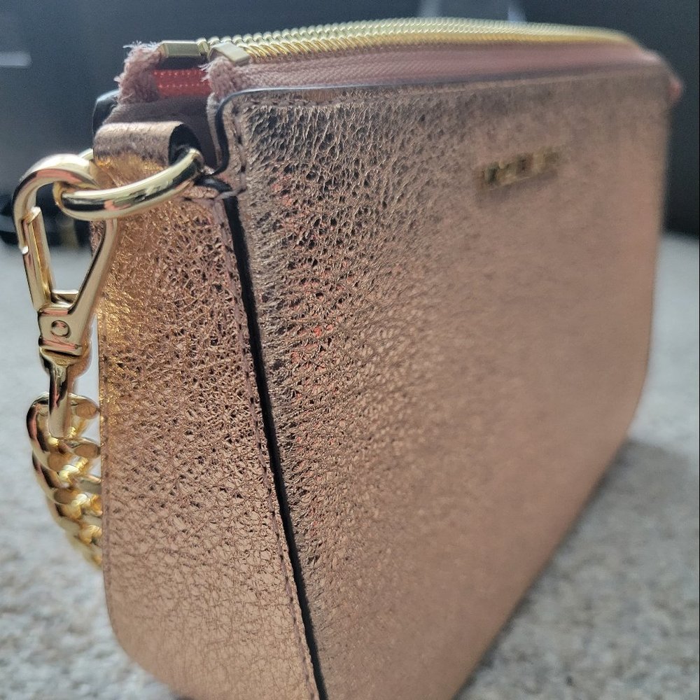 Michael Kors rose gold clutch and wallet set